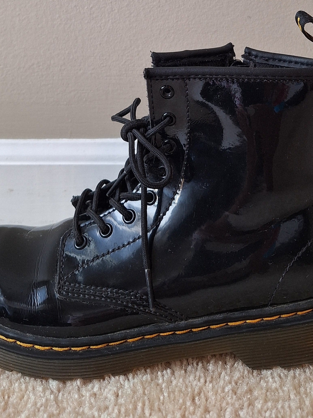 Dr. Martens Black Patent Lace-Up Kids Boots with Yellow Stitching